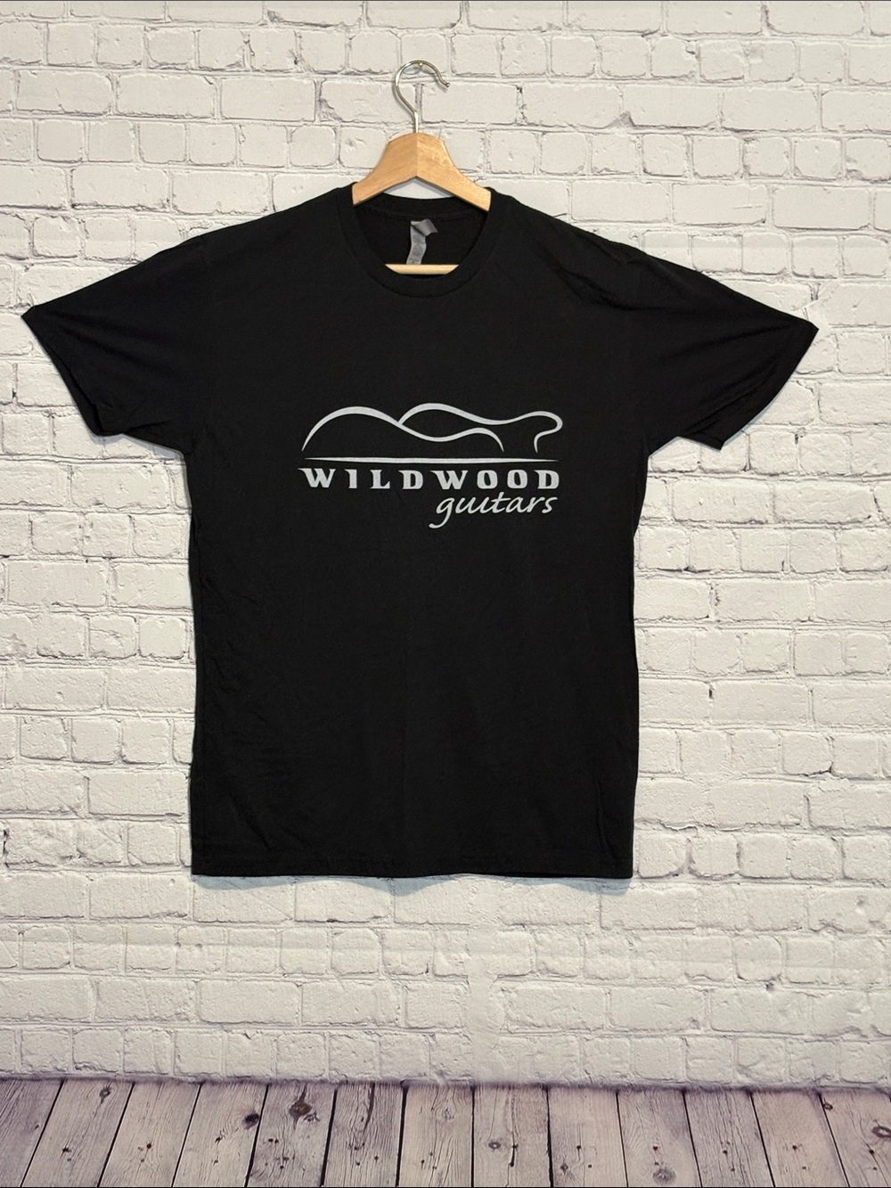 Next Level Apparel Black T-Shirt with White Wildwood Guitars Logo
